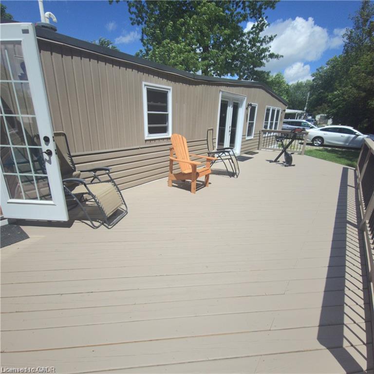 Expansive exterior deck space featuring a light-toned surface