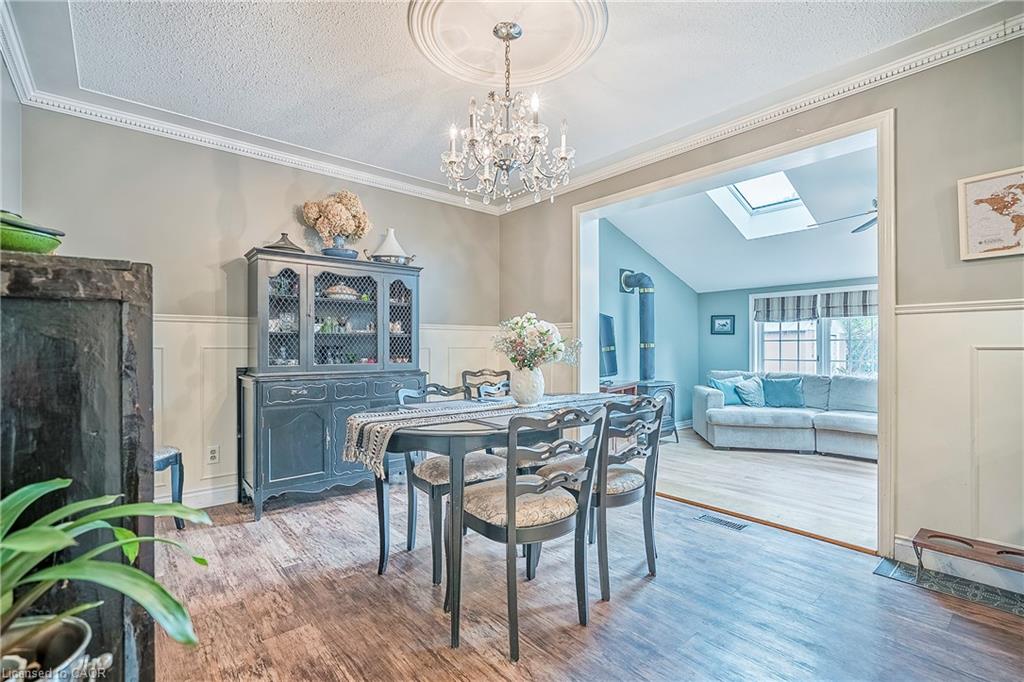 Elegant dining room with access to the back living room.