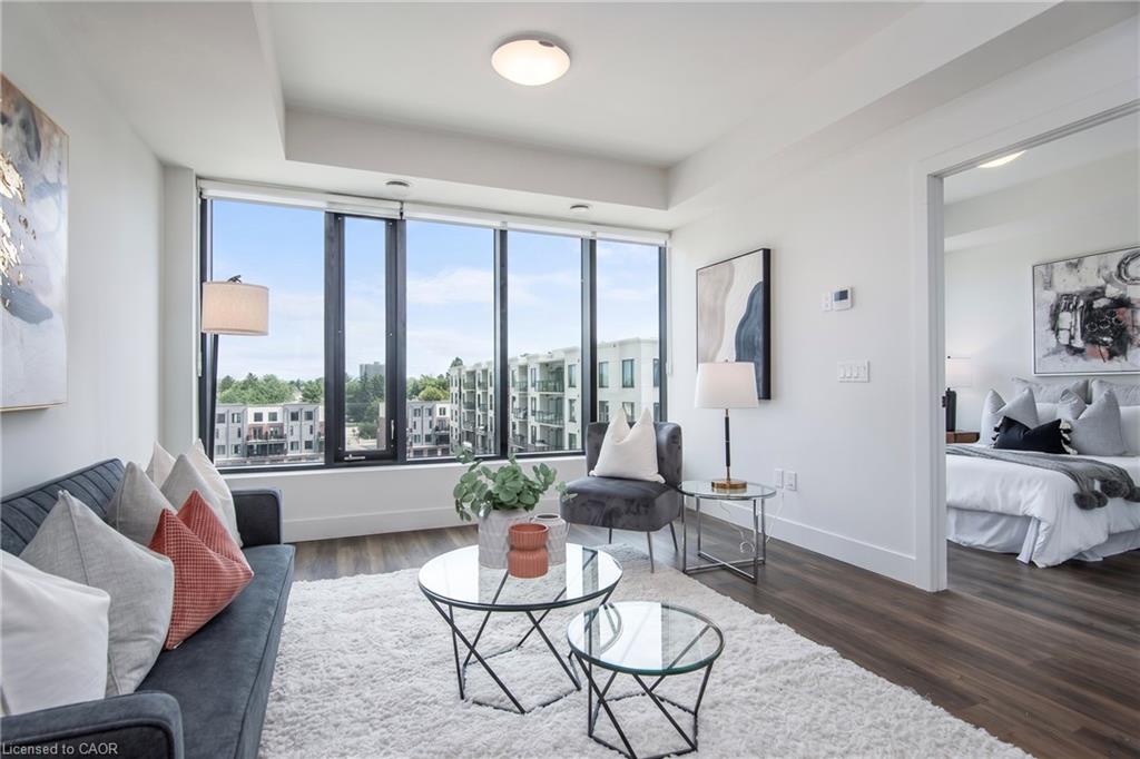 Light-filled living area featuring floor-to-ceiling windows,