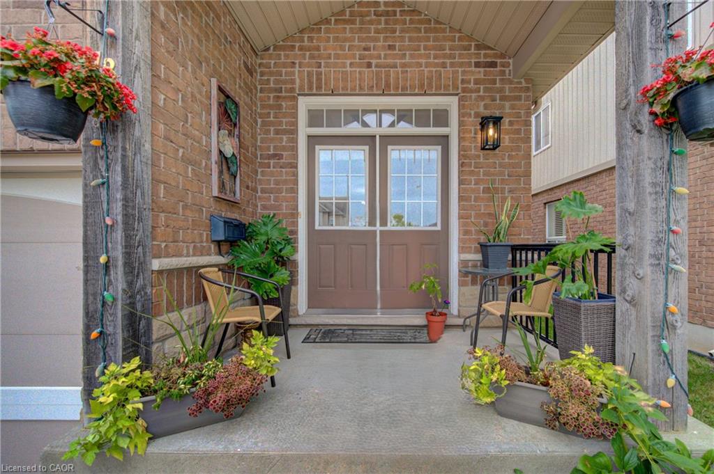 Brick  with siding and a covered porch