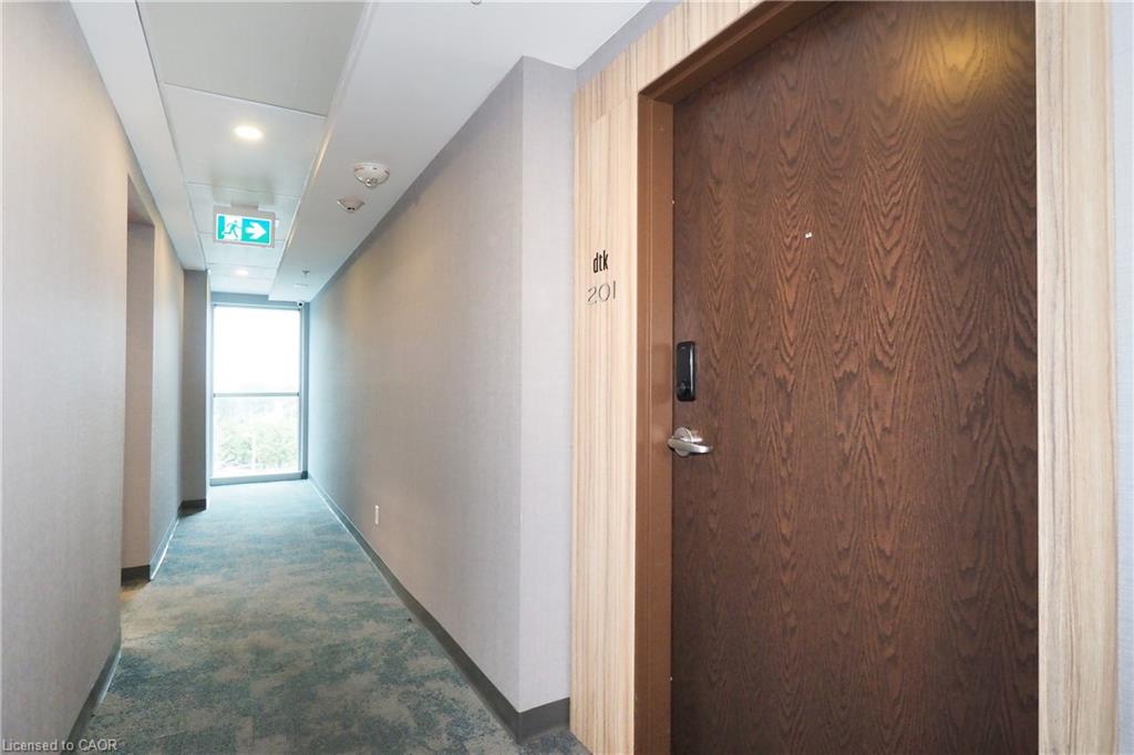 Wood-finish entry door with modern electronic lock