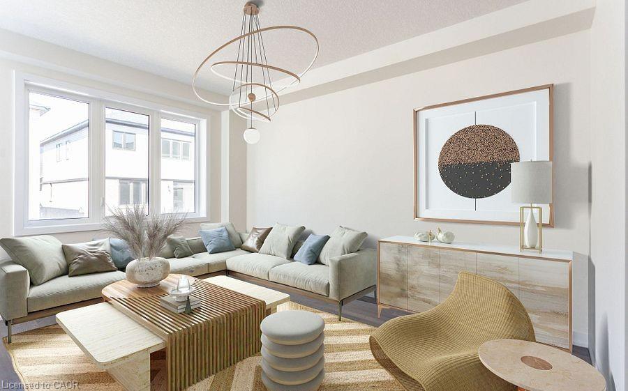 Spacious living area featuring large windows, wood-finish flooring, a contemporary chandelier, and a built-in console table with a light-toned countertop