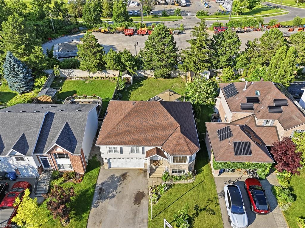 Front-facing garage with a paved driveway