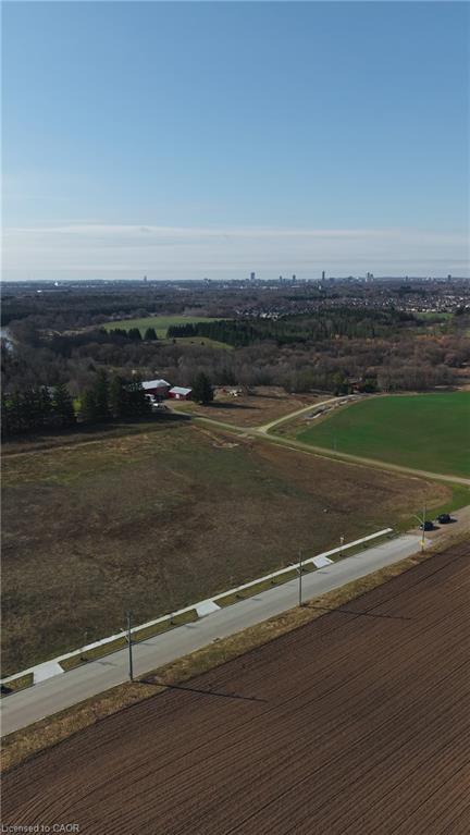 Aerial view of sparsely populated area featuring abundant farmland