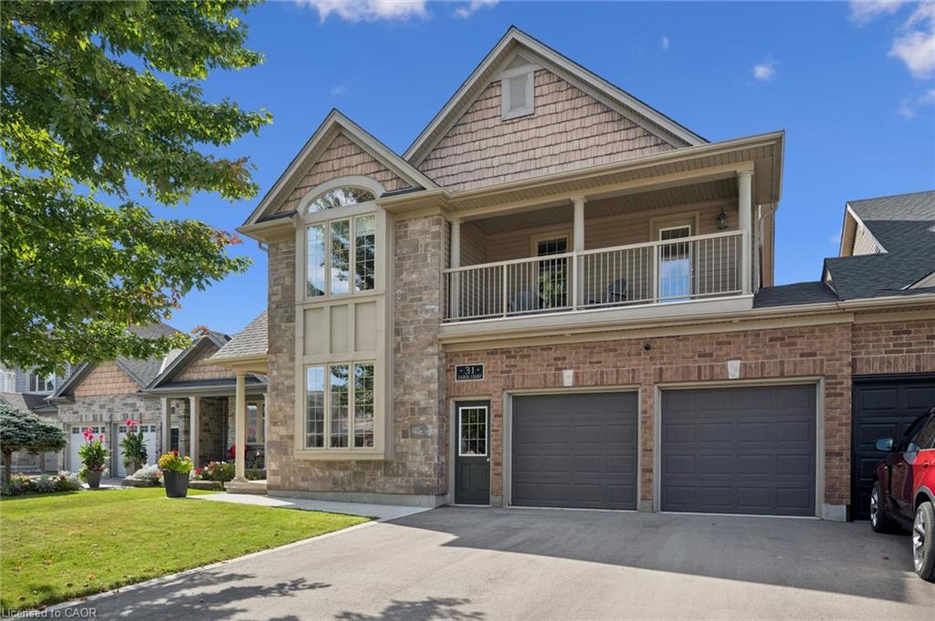 Brick and stone exterior with cedar shake accents