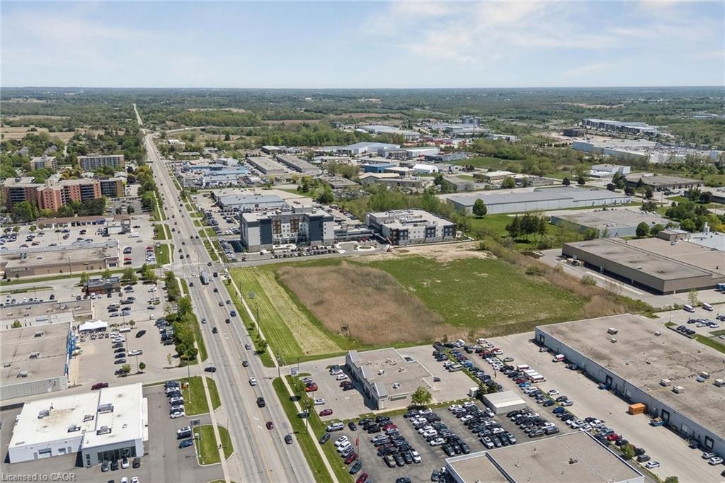 Aerial perspective showcasing a major thoroughfare with commercial and industrial properties