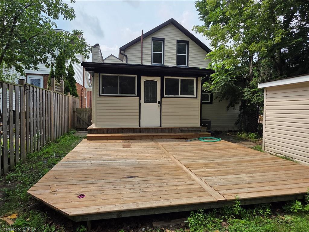 Expansive wood deck with a privacy fence