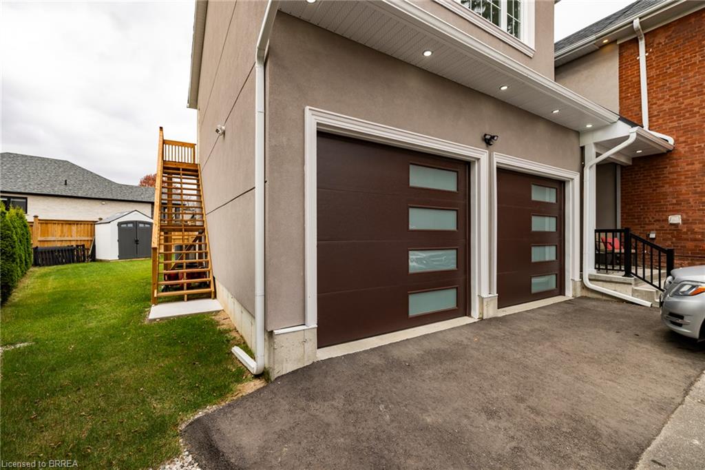 Entrance to property featuring a lawn