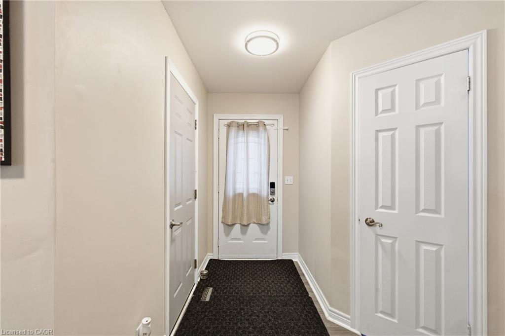 Recessed lighting illuminates the entryway