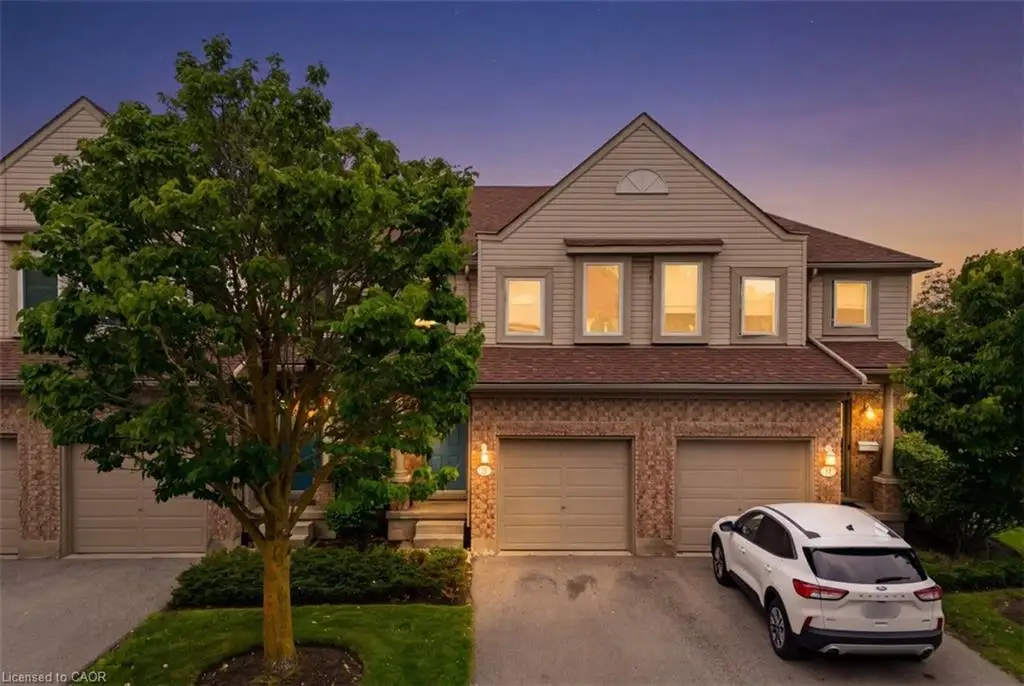 Front exterior showcasing a dual-tone facade with brick and siding