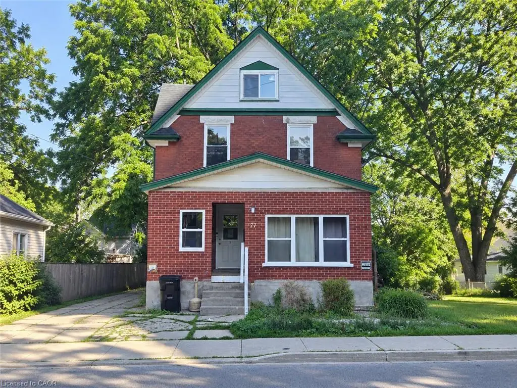 Red brick exterior with white trim