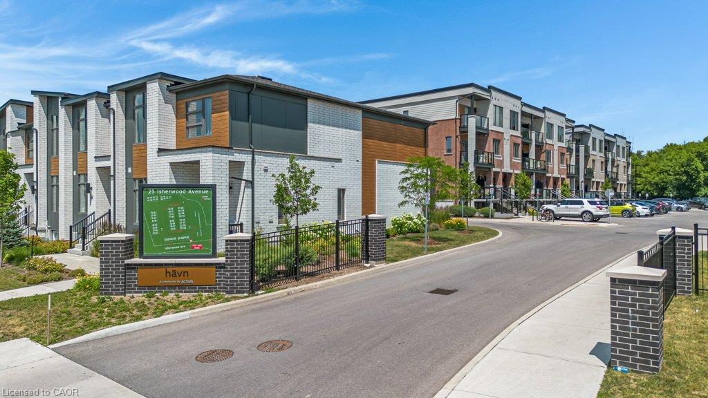 Modern townhome development featuring a contemporary architectural style, varied exterior finishes, and dedicated parking
