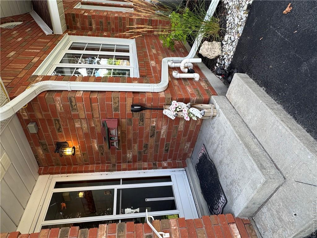 Brick exterior with white window trim