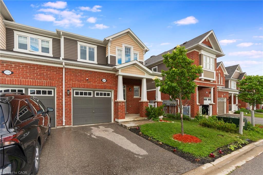 Brick and siding exterior with gabled roofline