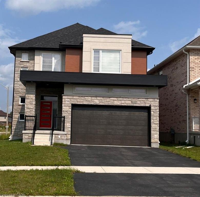 Contemporary exterior featuring stone and wood-look siding