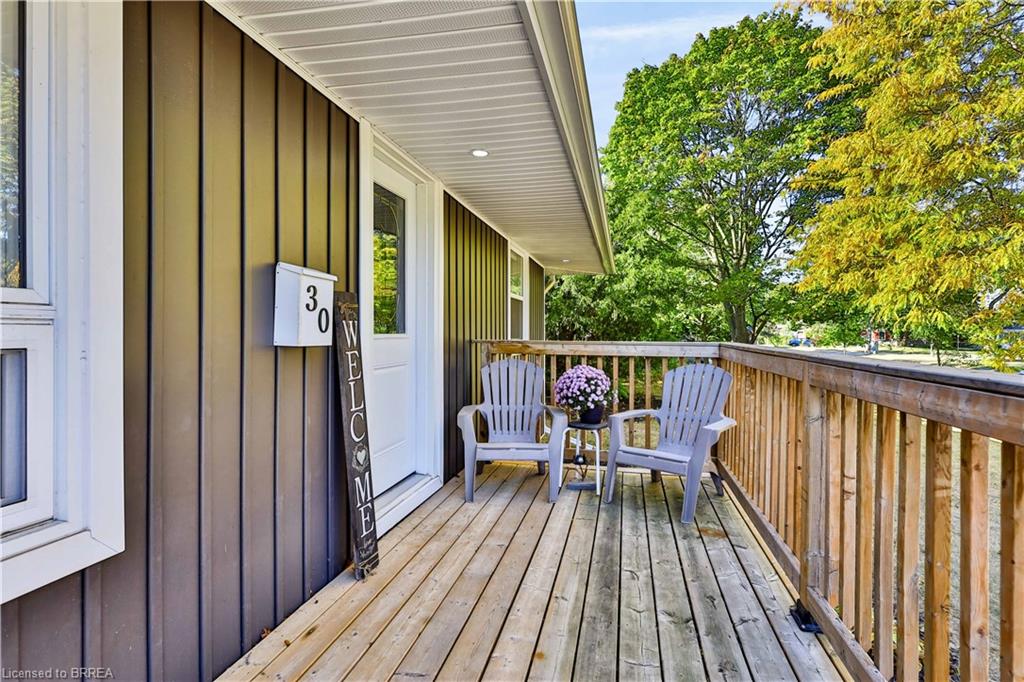 The front porch (2023) is the perfect place for a seat.