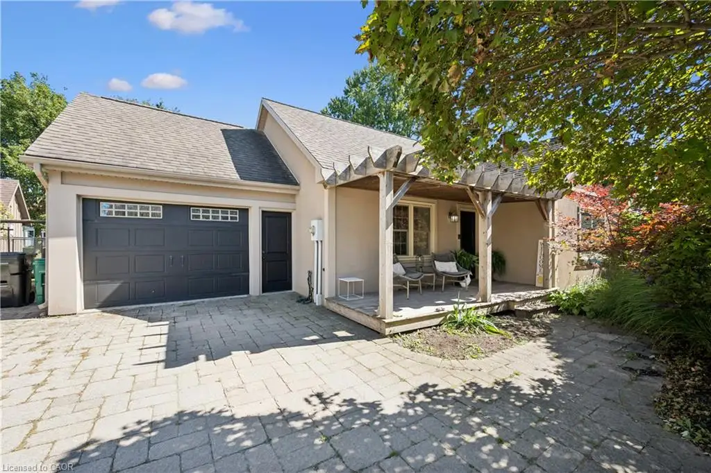 Attached two-car garage with transom windows
