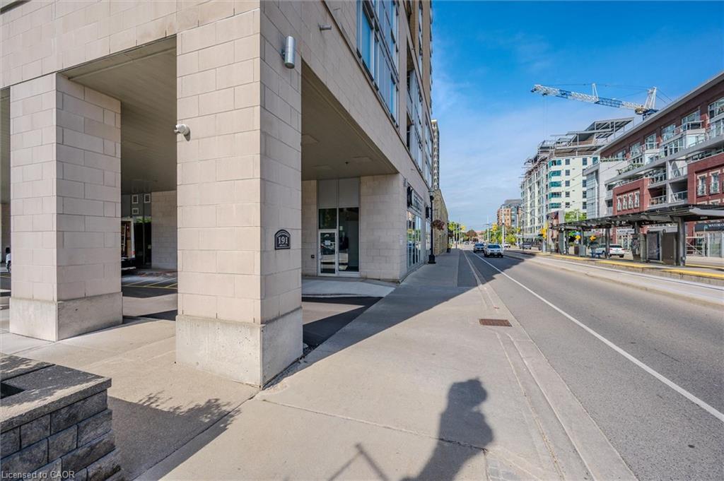Building exterior with a street-facing entrance, sidewalk, and street visible