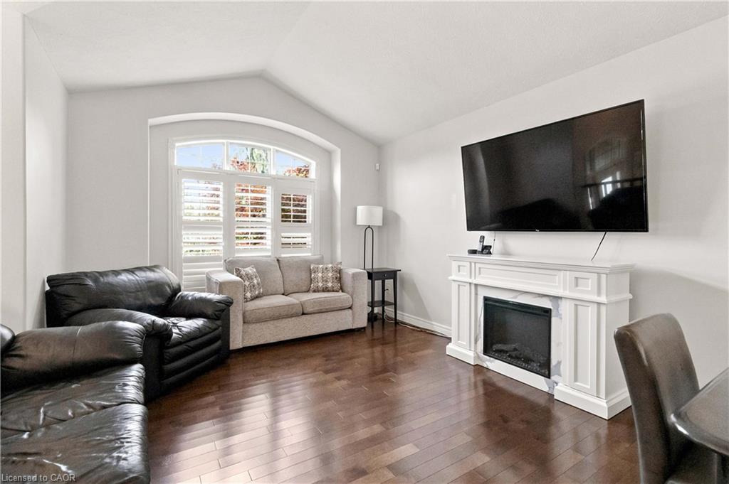 Bright open concept living room that is currently also being used as a dining area as the dining room is currently operating as a music room