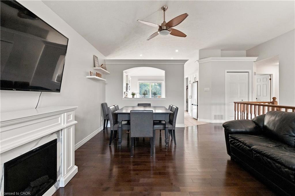 Bright open concept living room that is currently also being used as a dining area as the dining room is currently operating as a music room
