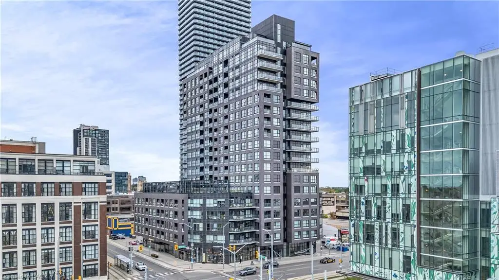 Contemporary high-rise building with a dark facade