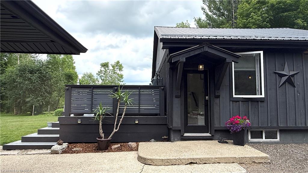 Board and batten exterior with a metal roof