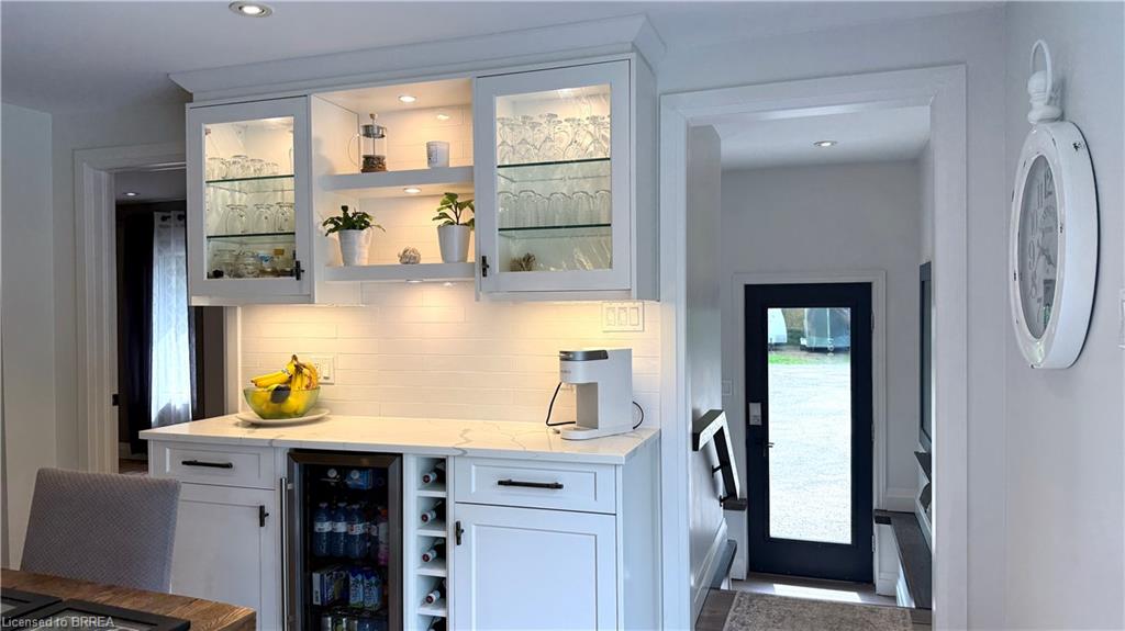 Coffee and beverage bar includes wine fridge