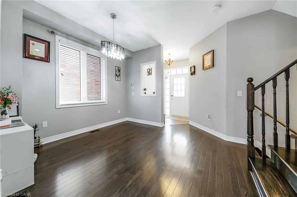 Spacious interior with dark wood-finish flooring
