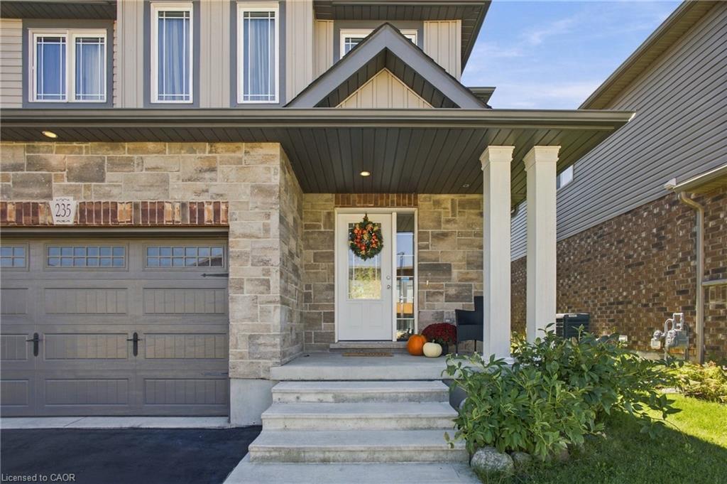 Stone and brick facade with a covered front entry