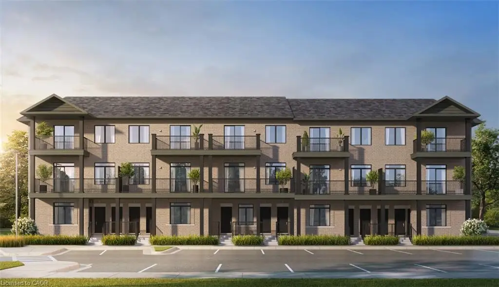 Multi-story exterior featuring masonry construction, pitched shingle roofing, private balconies with metal railings, and multi-pane windows