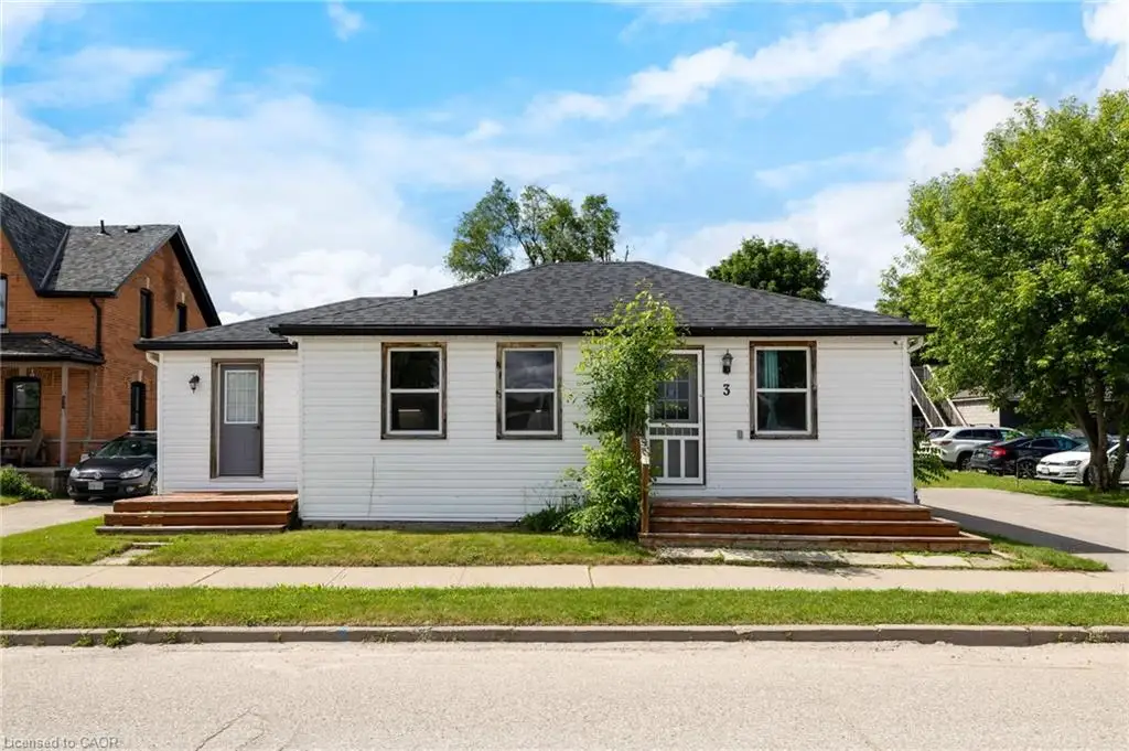 Single-story exterior featuring white horizontal siding, a dark shingled hip roof, and dual wood-plank entry steps