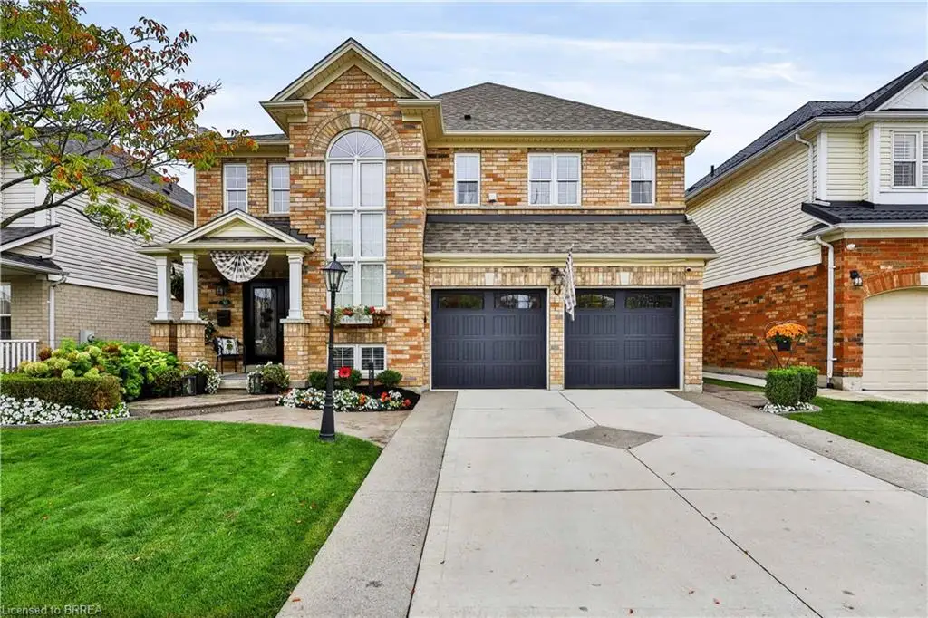 Brick exterior with a prominent arched window feature